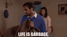 Parks And Rec Tom Haverford GIF - Parks And Rec Tom Haverford Life Is Garbage GIFs