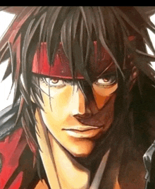a close up of a man 's face with a red bandana around his head