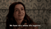 a woman is smiling and saying we have this whole life together
