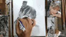 a person is drawing a woman 's face with a blue marker