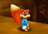 a cartoon squirrel in a blue shirt is standing on a table .