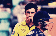 a cricket player wearing a shirt that says ' cricket world cup ' on it