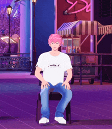 a man with pink hair is sitting on a chair in front of a popcorn cart