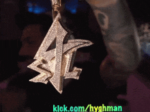 a picture of a necklace with the website kick.com/hyghman