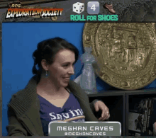 a woman in a purple shirt with the name meghan caves on the front