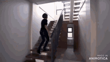 a person is walking up a set of stairs made by animatica
