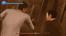 a man in a suit is laying on the ground in a video game being kicked