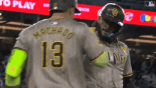 a baseball player with the number 13 on their back