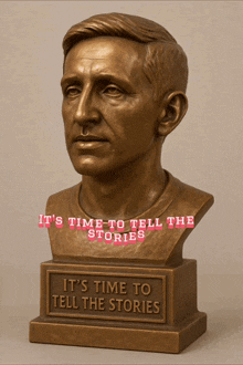 a statue of a man with the words it 's time to tell the stories written on it