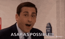 a man in a suit and tie is making a surprised face and saying `` asap as possible ! ''