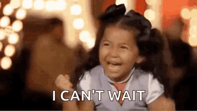 a little girl is crying and saying `` i can 't wait '' while holding her fists in the air .