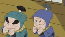 two cartoon characters with one wearing a blue hat with the letter o on it