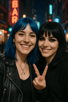 two women with blue hair giving a peace sign in front of a bar sign