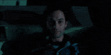 a man in a dark room with the words i told you i 'd put you at the center of the universe below him