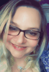 a woman wearing glasses and a necklace that says run on it