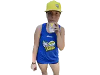 a woman drinking through a straw wearing a blue shirt that says hill volley