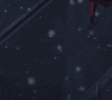 a person in a red suit is laying on the ground