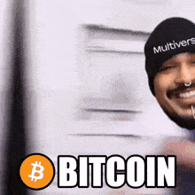 a man wearing a hat that says " multiverse " is smiling and says bitcoin