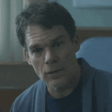 a man in a robe has the word no written on his forehead