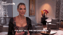 a woman says it 's not all the information in front of a living room