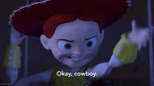 jessie from toy story says " okay cowboy " in a dark room