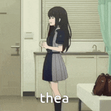 a girl standing in a room with the word thea written on the bottom