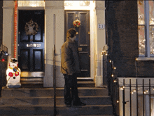 Love Actually Jump From Stairs GIF - Love Actually Jump From Stairs Martin Freeman GIFs