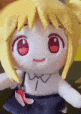 a stuffed doll with blonde hair and red eyes is wearing a white shirt and blue skirt