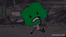 a green background with a cartoon face and the words gifrun.com