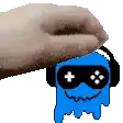 a hand is holding a blue cartoon character wearing headphones and goggles .
