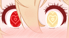 a close up of a girl 's eyes with red and yellow hearts