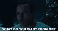 a man in a white shirt is asking what do you want from me