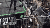 a wrestling ring with a banner that says iwtv live on it
