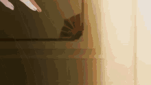 a close up of a person holding a fan in a room