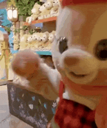 a close up of a stuffed animal in a store .