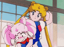 a cartoon of a girl holding another girl in her arms with the caption el.nakamura on the bottom