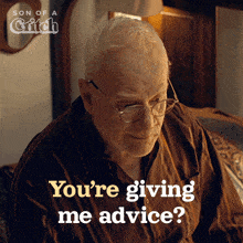 an older man with glasses is asking if he is giving me advice