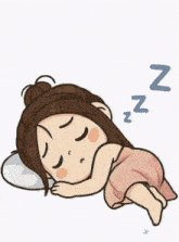 a cartoon girl is sleeping on a pillow with the letter n above her