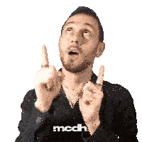a man wearing a black shirt that says mcdh