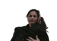 a woman is wearing a scarf around her neck and a black jacket