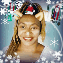 a picture of a woman with a santa hat on her head and snowflakes around her
