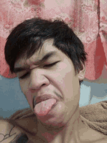 tongue out bleh selfie guy