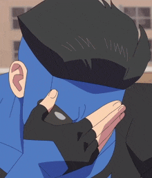 a cartoon character with a blue head and black gloves covering his face