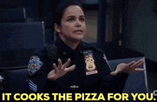 B99 Amy Santiago GIF - B99 Amy Santiago It Cooks The Pizza For You GIFs