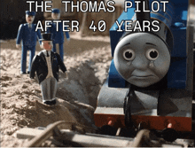a picture of thomas the train with the caption " the thomas pilot after 40 years " on the bottom
