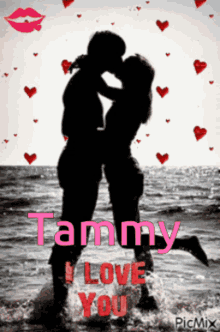 a picture of a man and woman kissing with tammy i love you written in pink