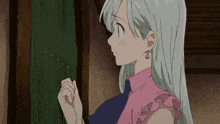 a girl with long white hair is wearing earrings and a pink top