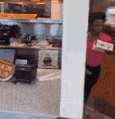 a woman is standing in front of a counter with a sign that says new menu on it .