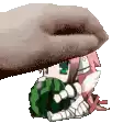 a pixel art of a girl holding a watermelon being pummeled by a hand .