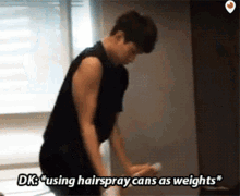 Seventeen Dokyeom GIF - Seventeen Dokyeom Using Hairspray As Weights GIFs